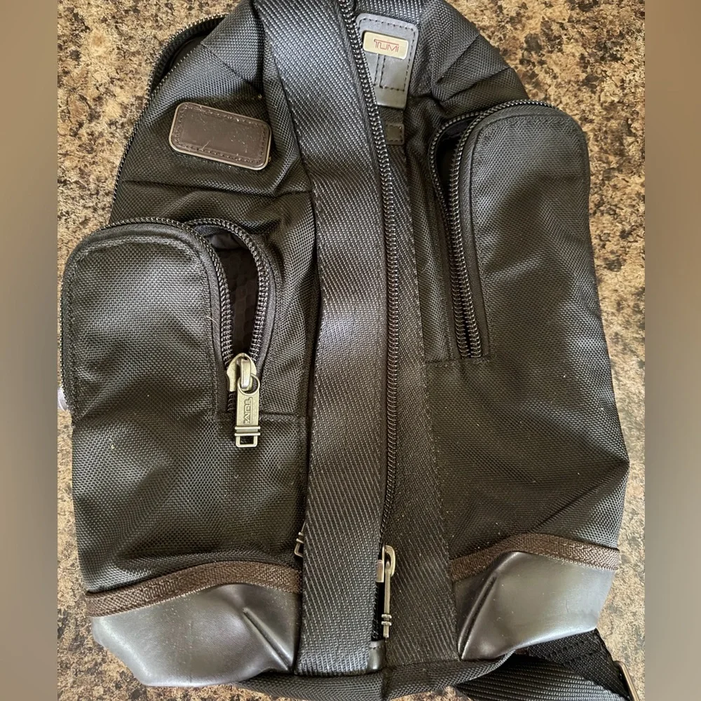 Unisex Tumi sling bag
